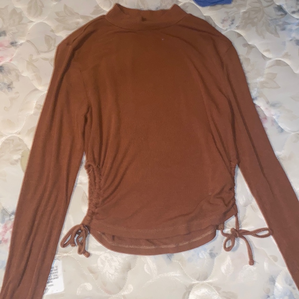 Copper brown crop top, long sleeve, adjustable strings on the side